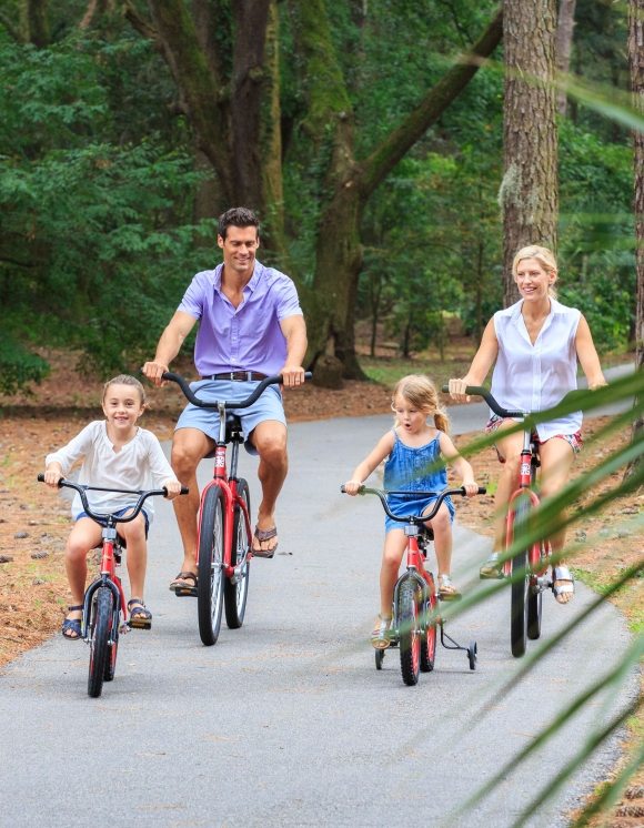 Family biking on a path 